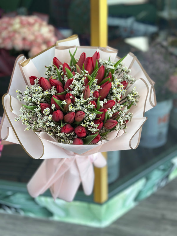 Radiant Bloom: Red Tulips with Elegance